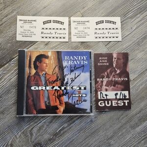 Randy Travis Greatest Hits Autographed.
